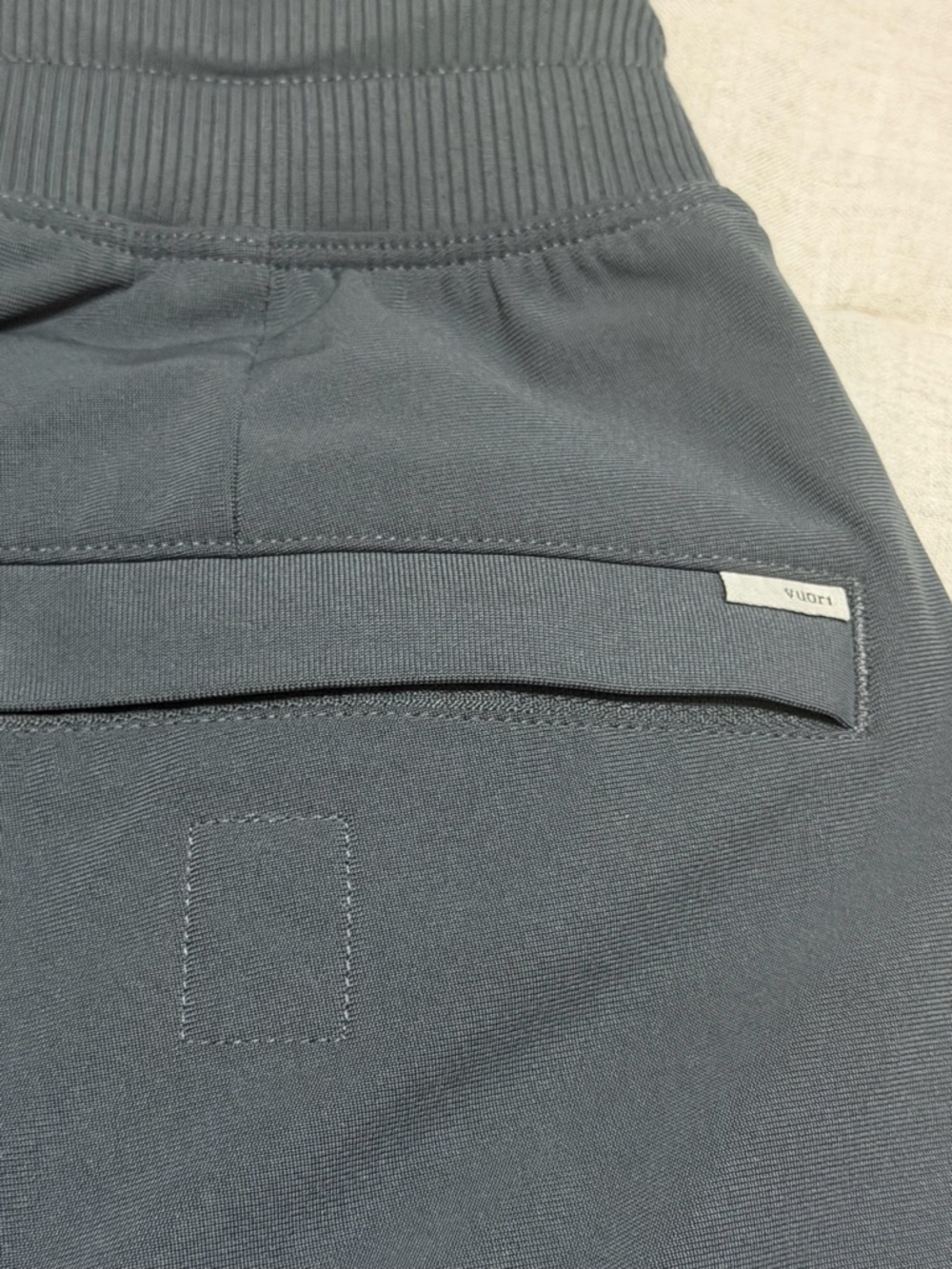 VUORI charcoal shorts size M